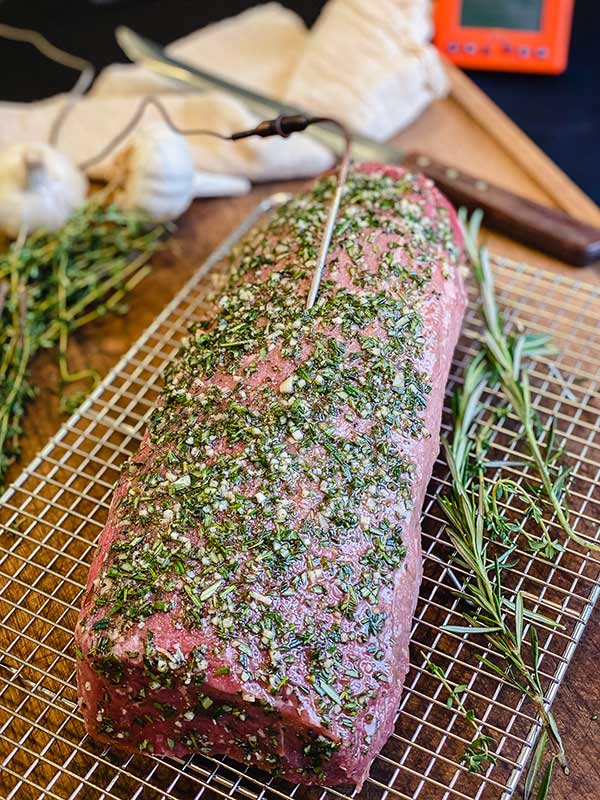 eye of round beef covered in herb paste