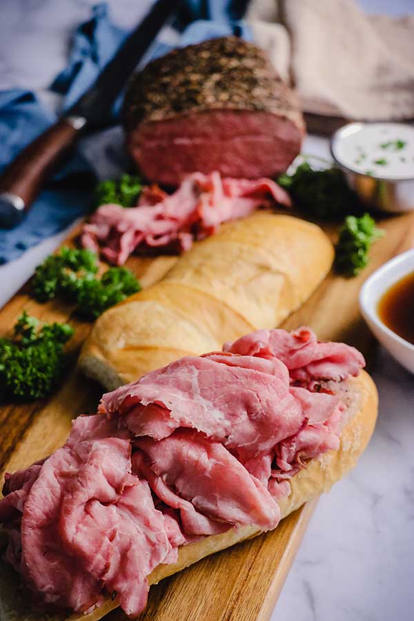 Roast beef piled high on fresh bun