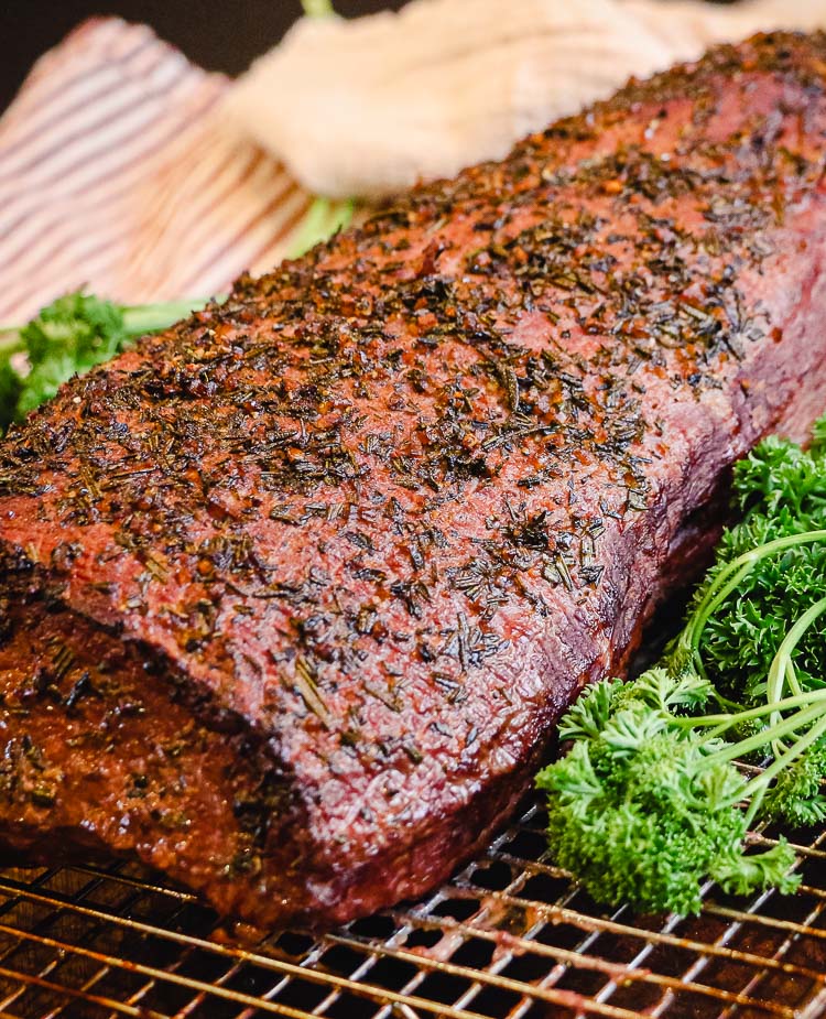 smoked eye of round roast on cooling rack