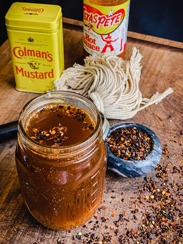 Dry mustard, Texas Pete hot sauce and smoked pepper combine to flavor East Carolina mop sauce