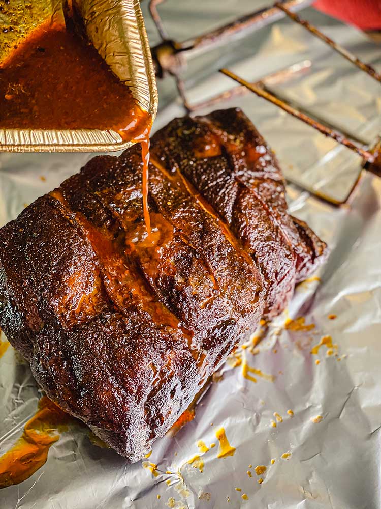 Pour East Carolina mop sauce over your favorite grilled brisket or roast