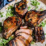 grilled pork chops drizzled with maple marinade