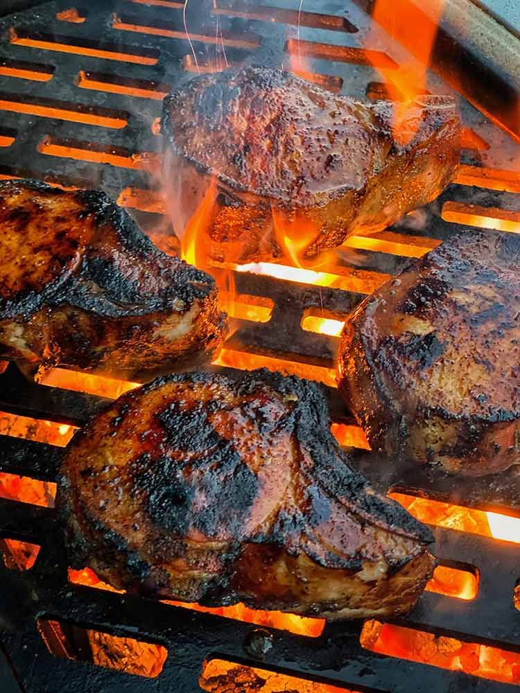 marinated pork chops over high direct heat