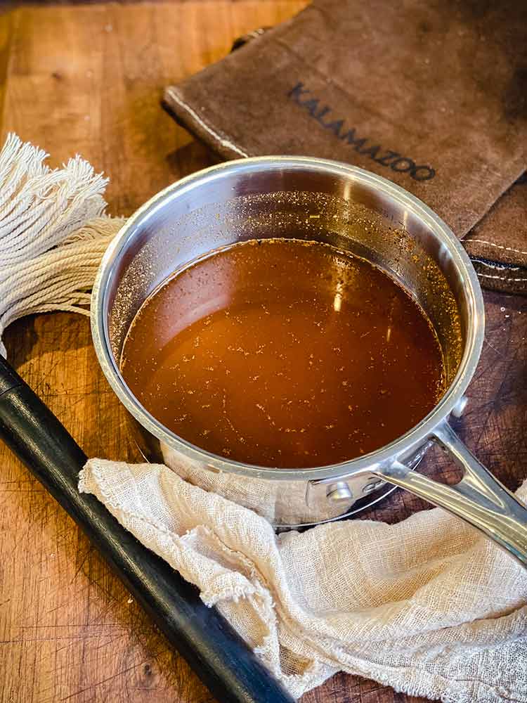 mop sauce and mop, ready for use while grilling baby back ribs