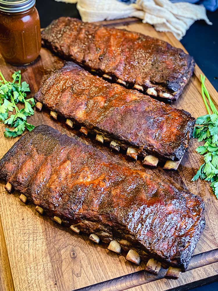three racks of barbecue ribs