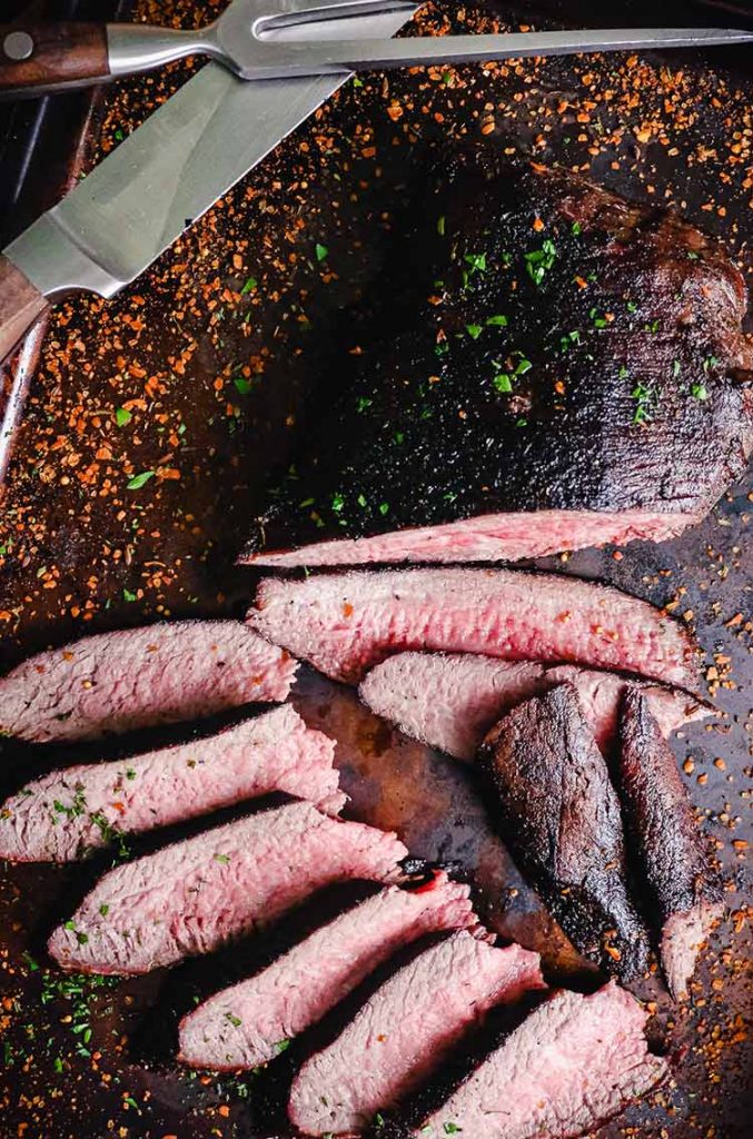 tri-tip cut against the grain for serving and enjoying