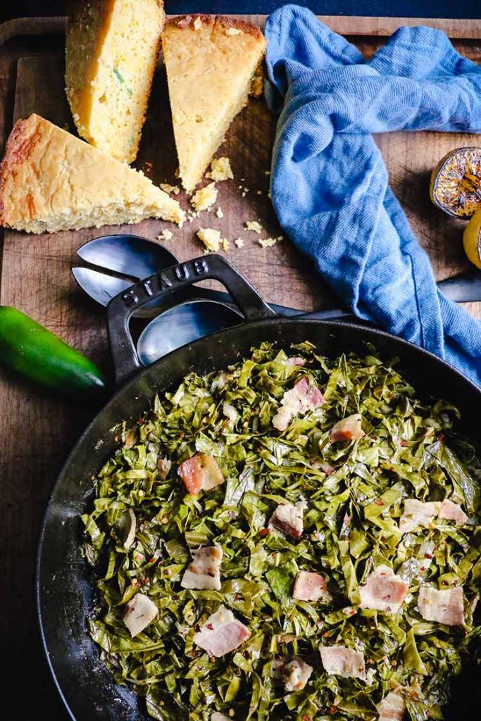 smoked collard greens with bacon tossed with red pepper flakes to serve