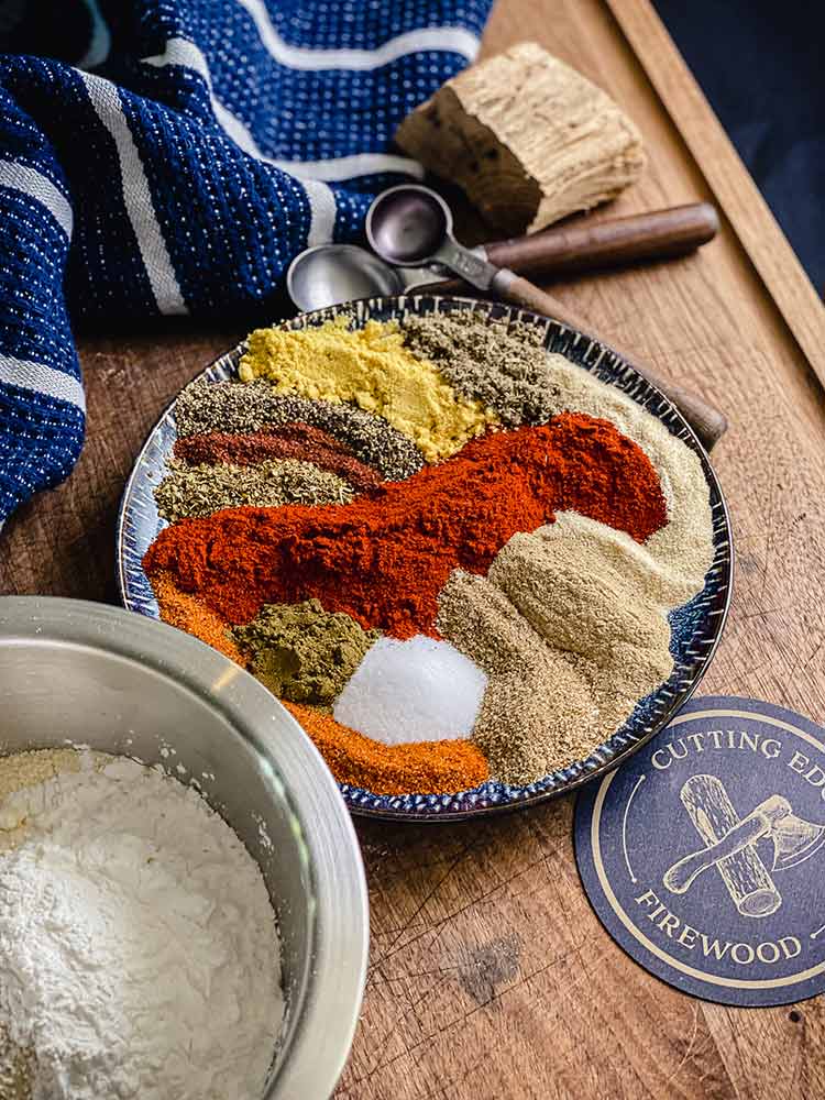 colorful plate of spices used for smoke fried chicken