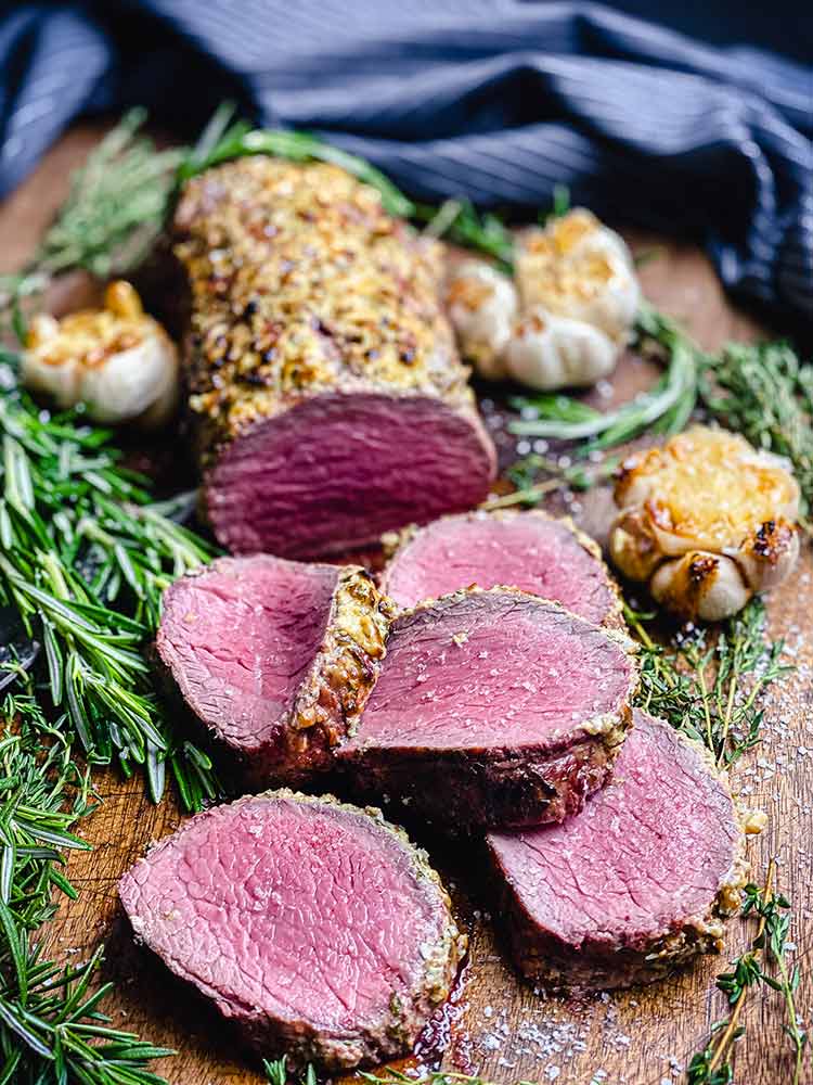 close up of medium rare medallions perfectly crusted by indirect high heat on a grill