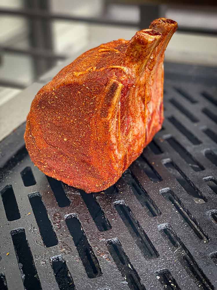 prime rib roast on grill over indirect heat