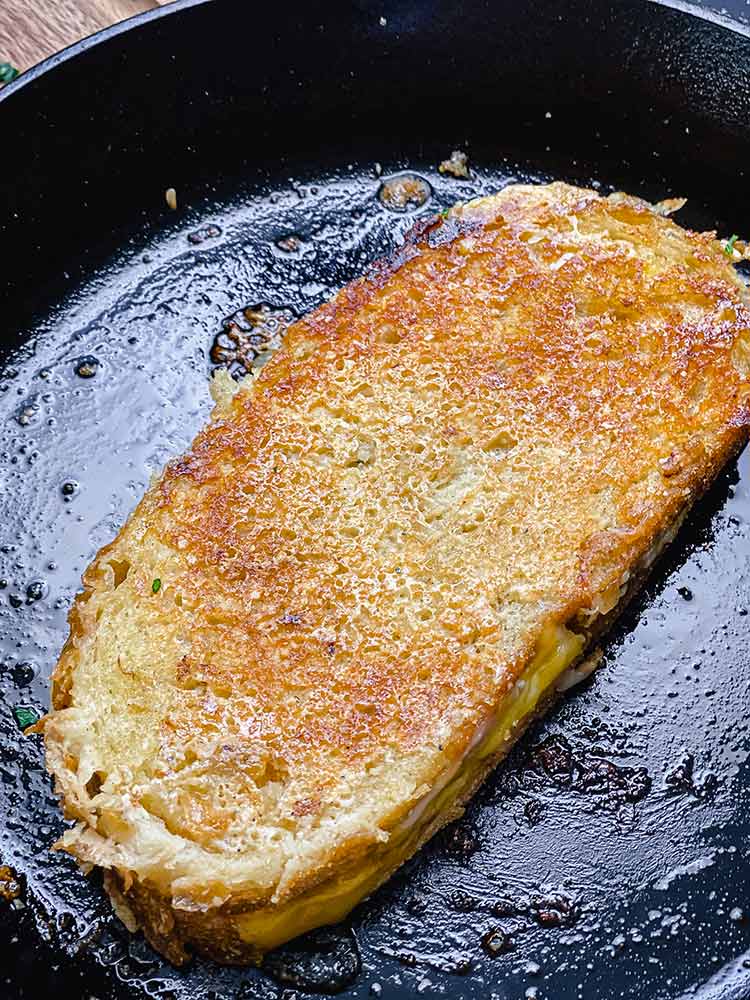  grilled cheese sandwich in skillet