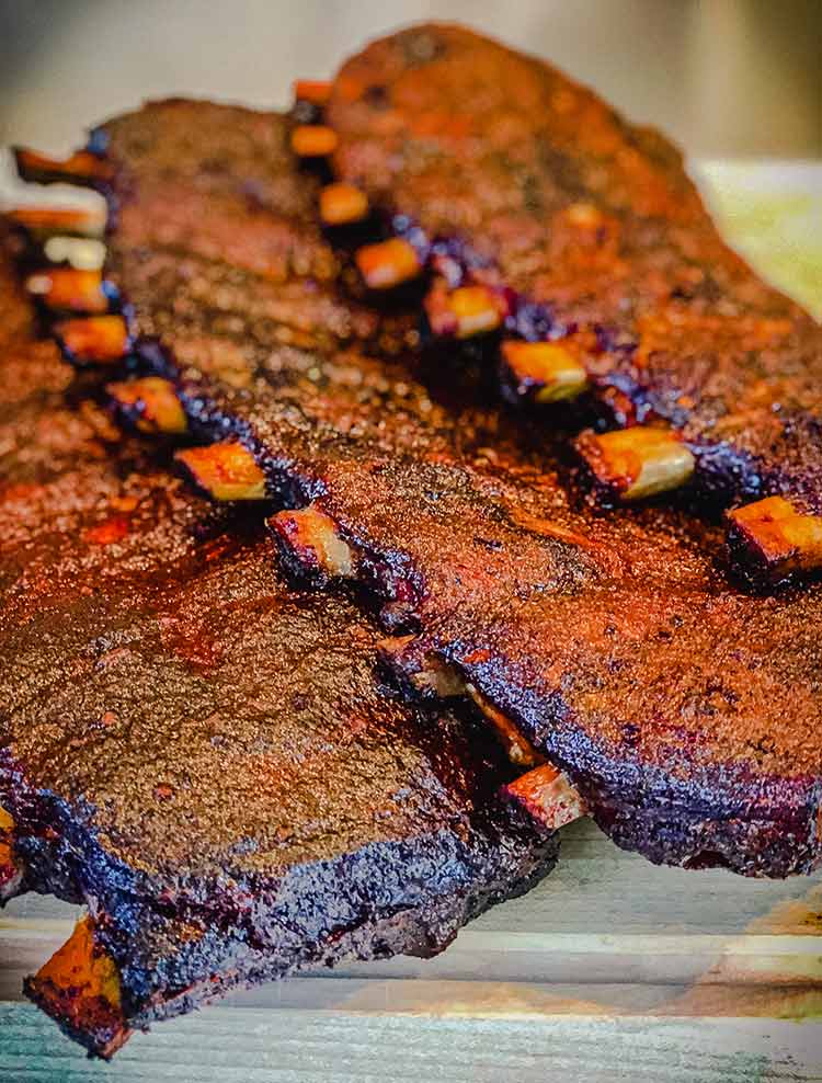 three slabs of pork ribs ready to serve 