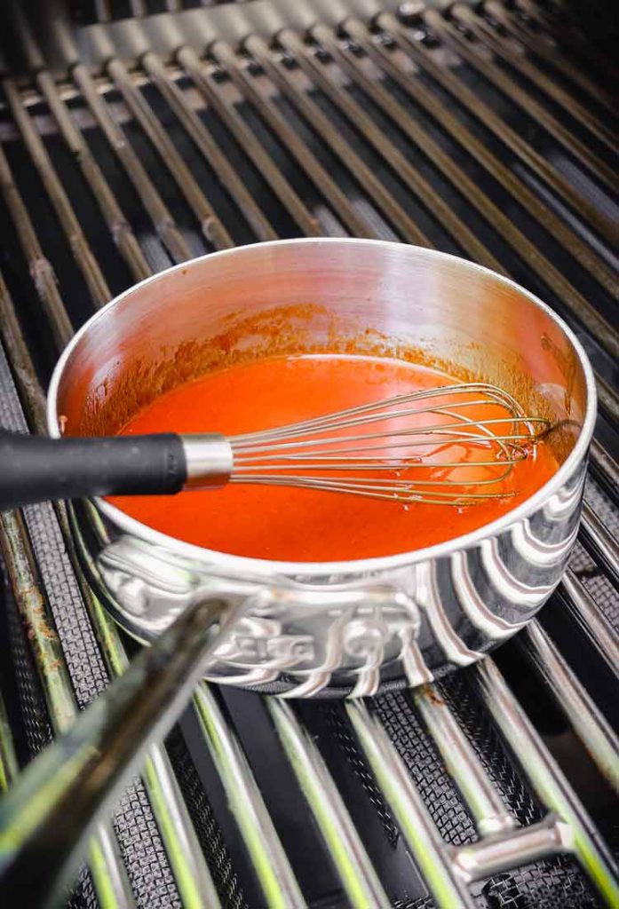  pan filled with Buffalo sauce