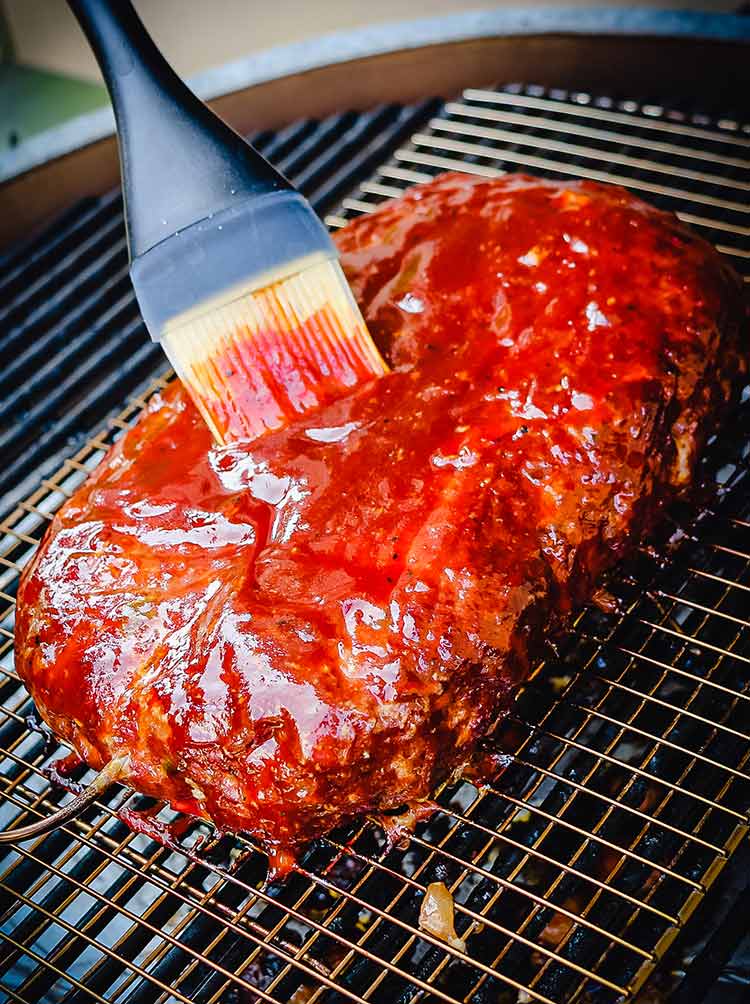 glazing with barbecue sauce using a pastry brush