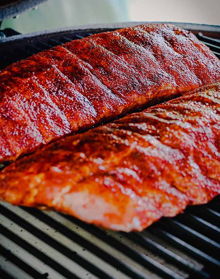 ribs on a grill over indirect heat