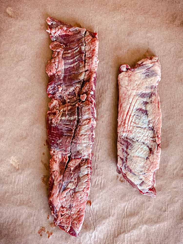 long, thick strip of meat next to shorter inside cut with hard fat membrane