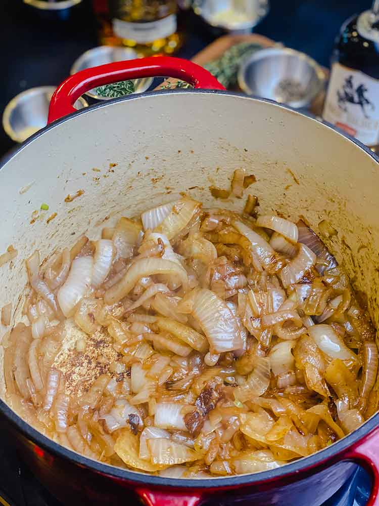 onions cooking in dutch oven