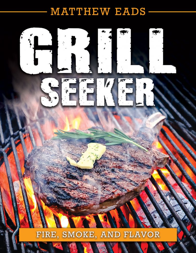 book cover with tomahawk steak on a grill and flames