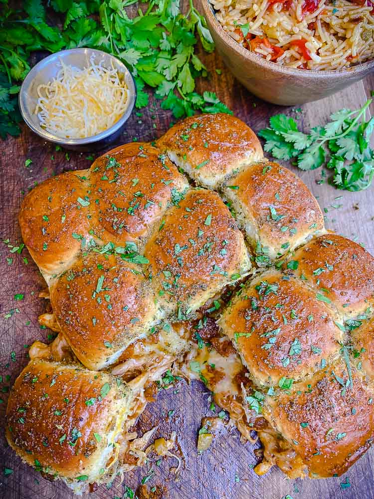 chicken enchilada sliders with Mexican rice ready to serve