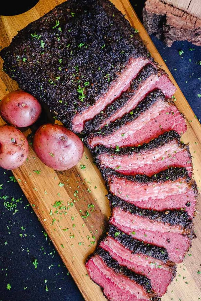 corned beef and potatoes on cutting board