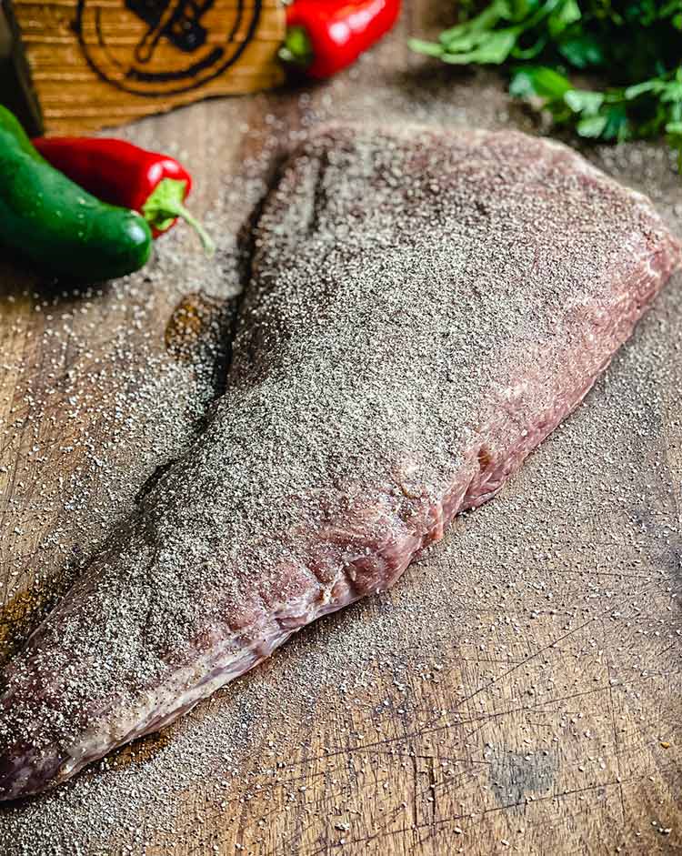 roast seasoned on a cutting board