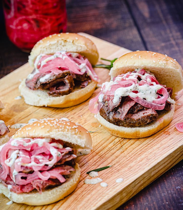 lamb sliders on cutting board ready to eat