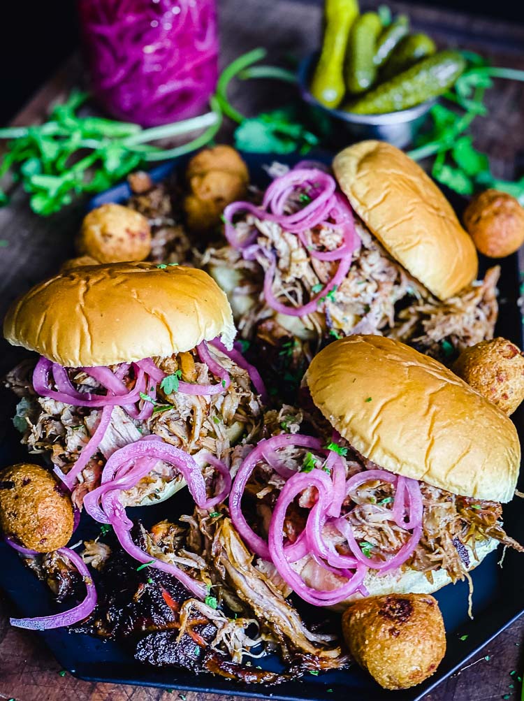 Pulled pork sandwiches with pickled red onions