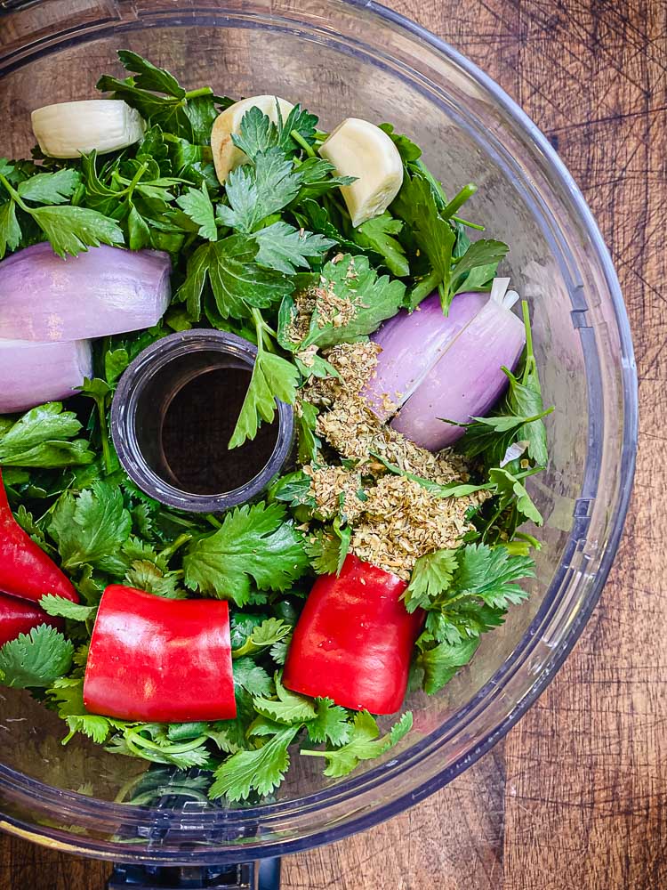 roughly chopped ingredients for chimichurri sauce in food processor