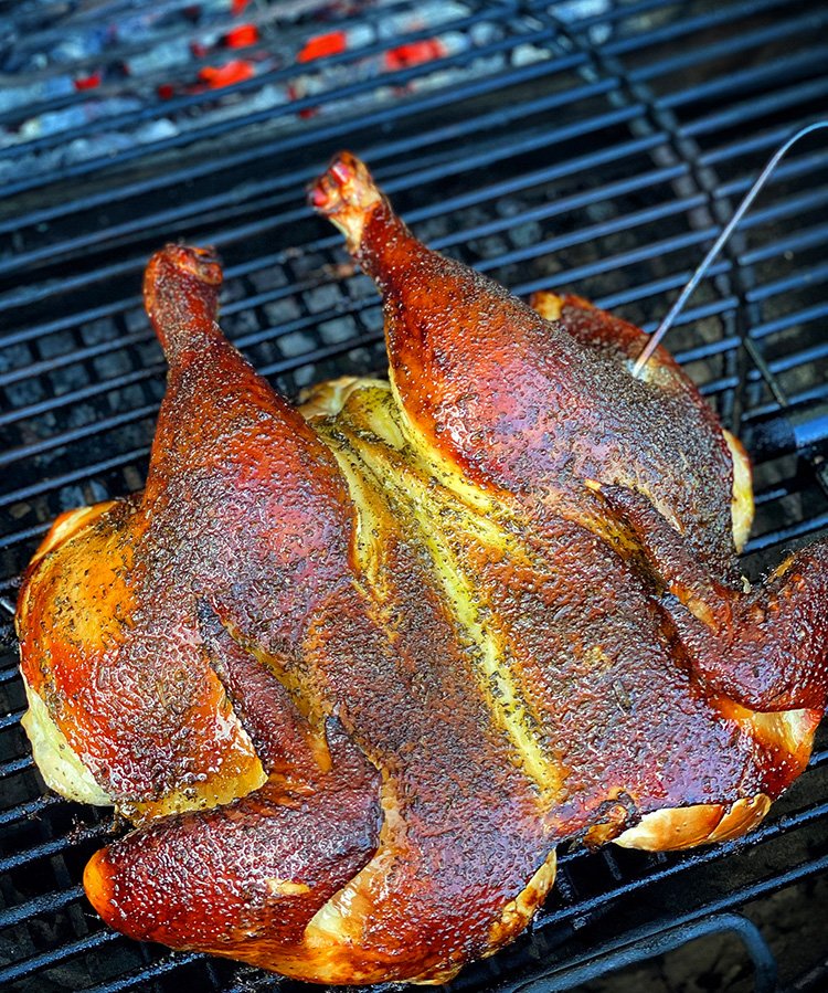 spatchcock chicken on a grill