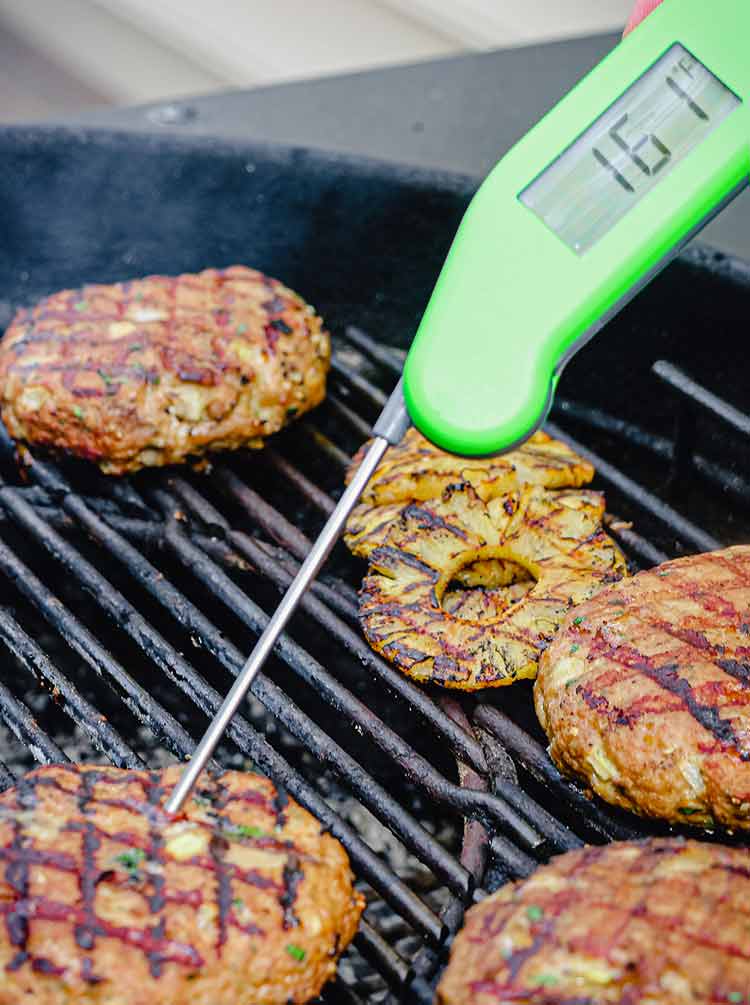 quick read thermometer showing meat temperature at 160 degrees.