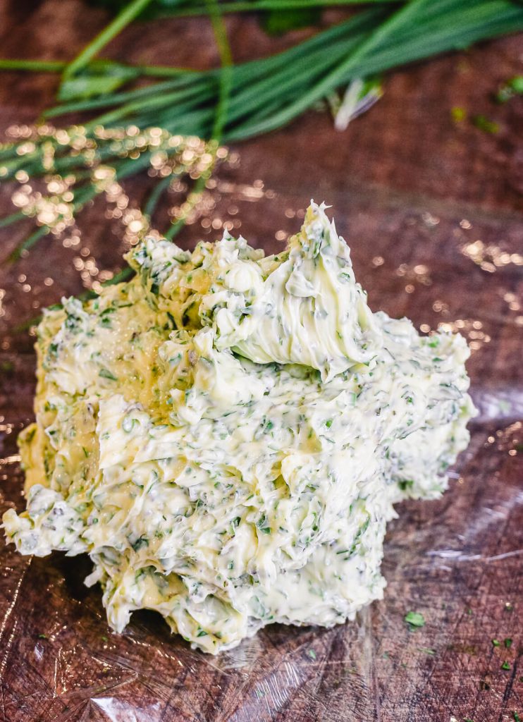 compound butter for steak on plastic wrap