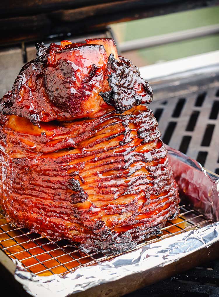 glazed ham on a grill