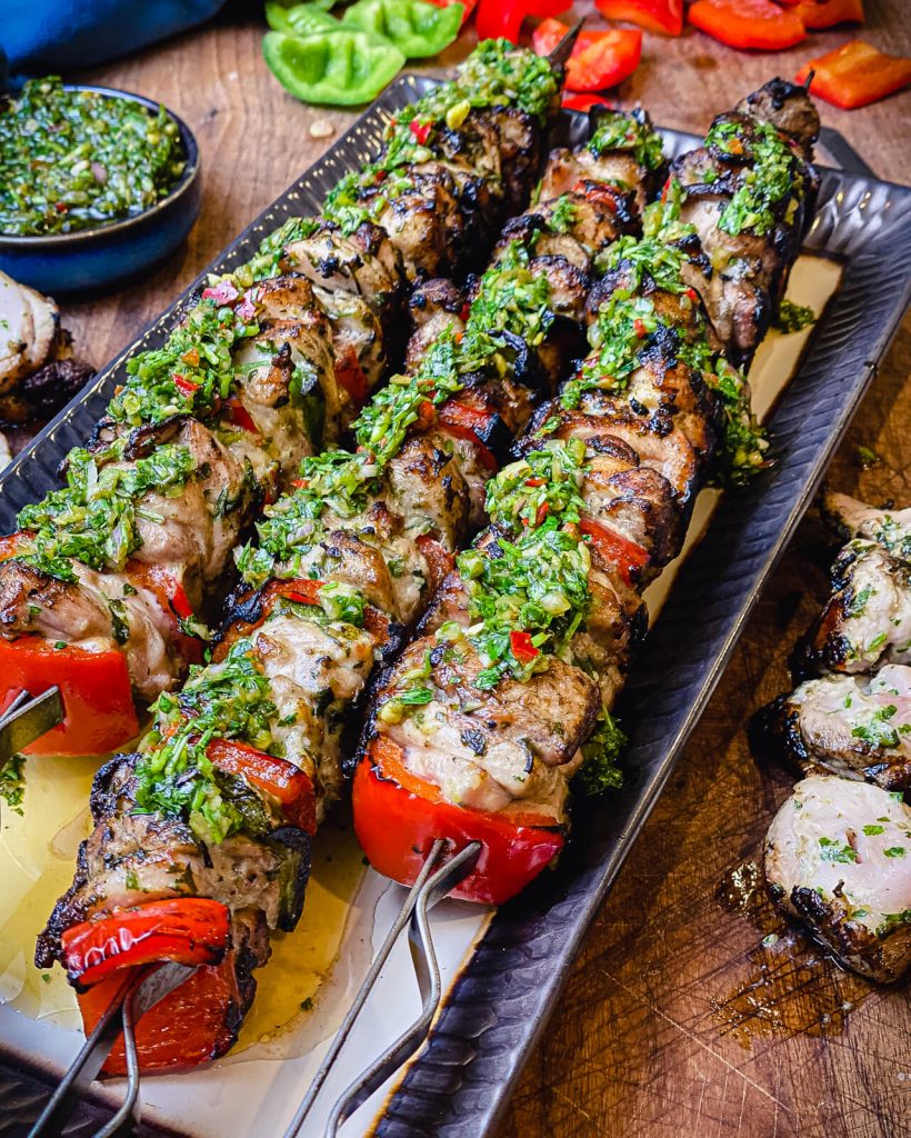 grilled chicken kabobs ready to serve on a platter