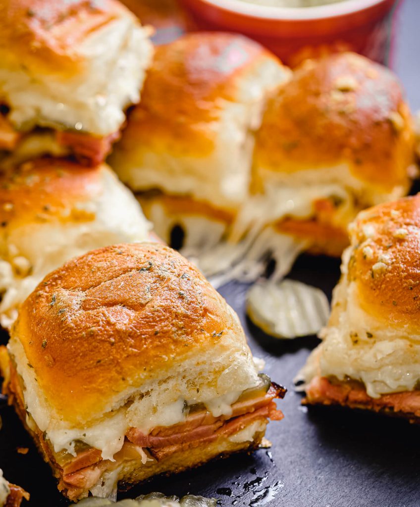 ham and cheese sliders on a platter