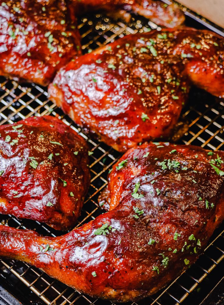 grilled chicken quarters with parsley garnish