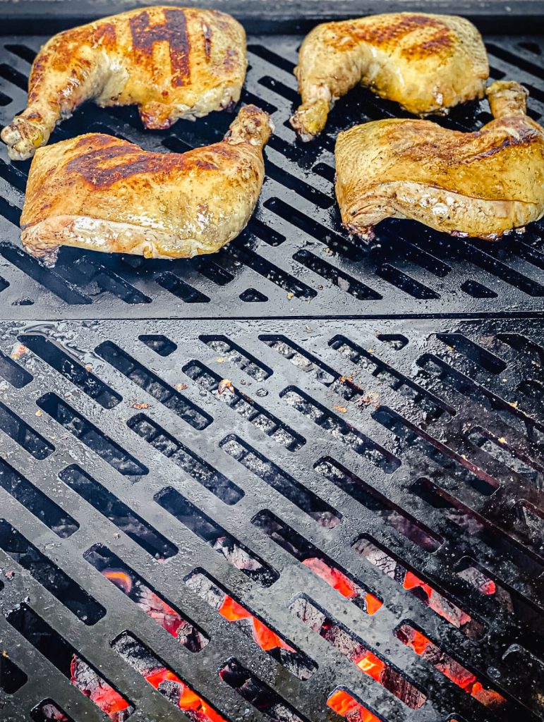 grilled chicken quarters over indirect heat on the grill