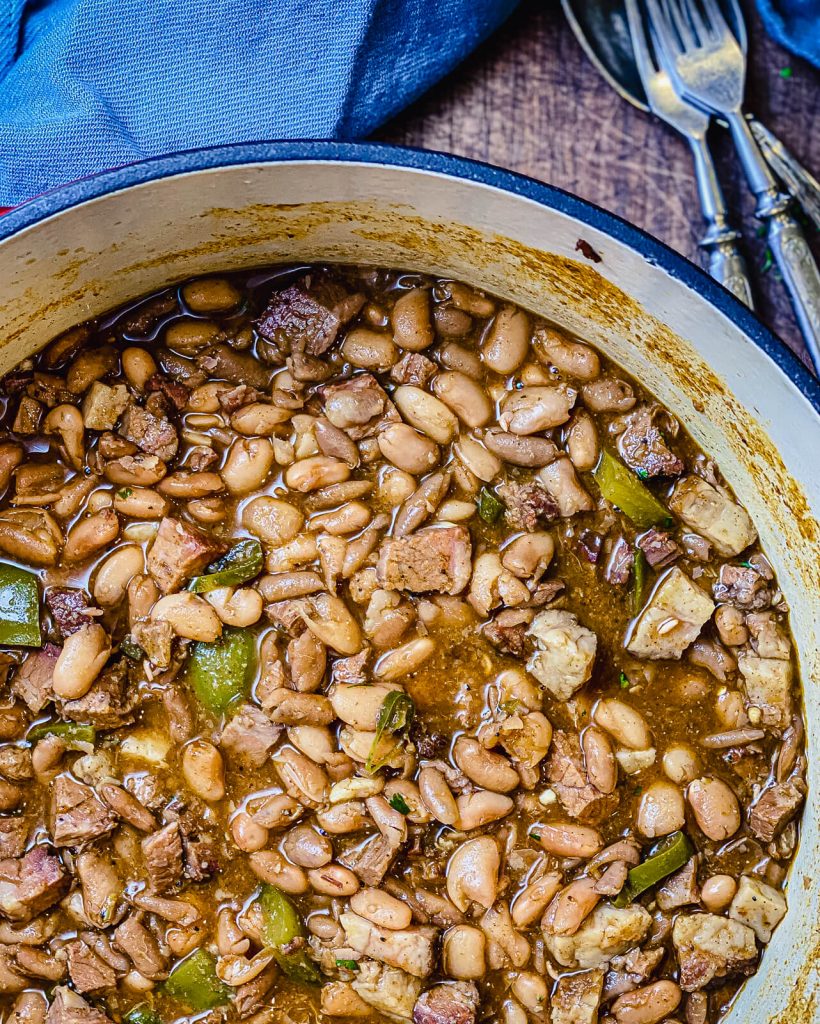dutch oven full of cooked pinto beans