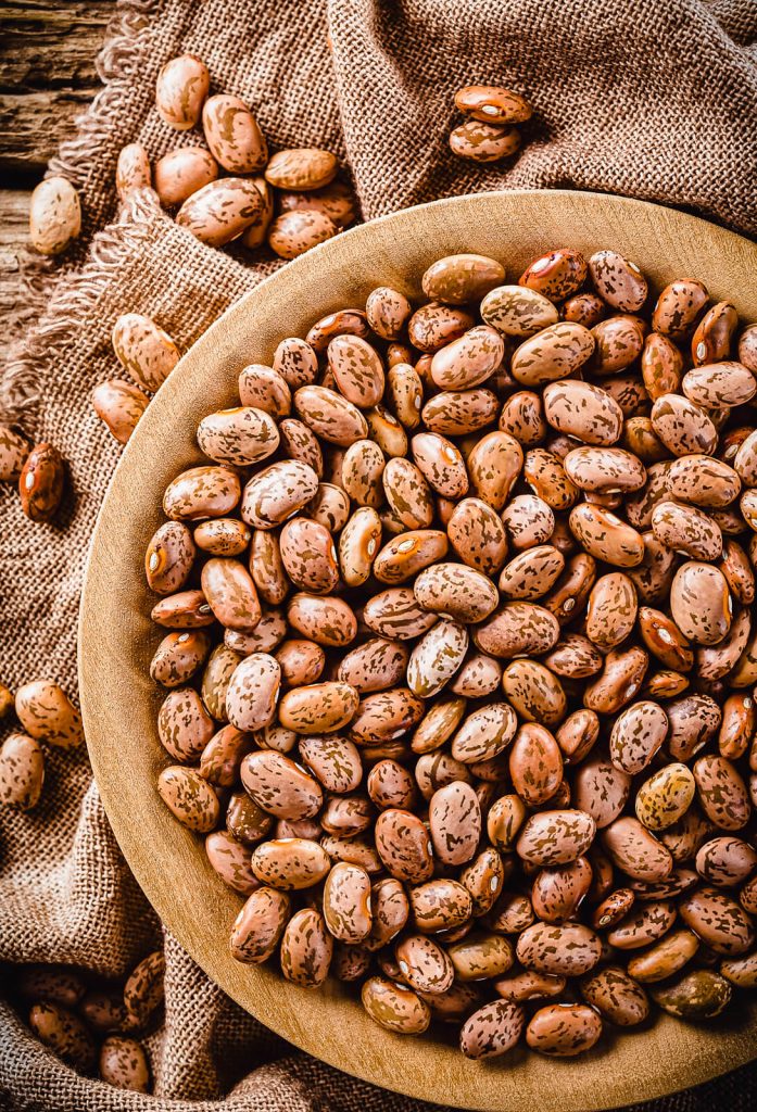 dry pinto beans in a bowl