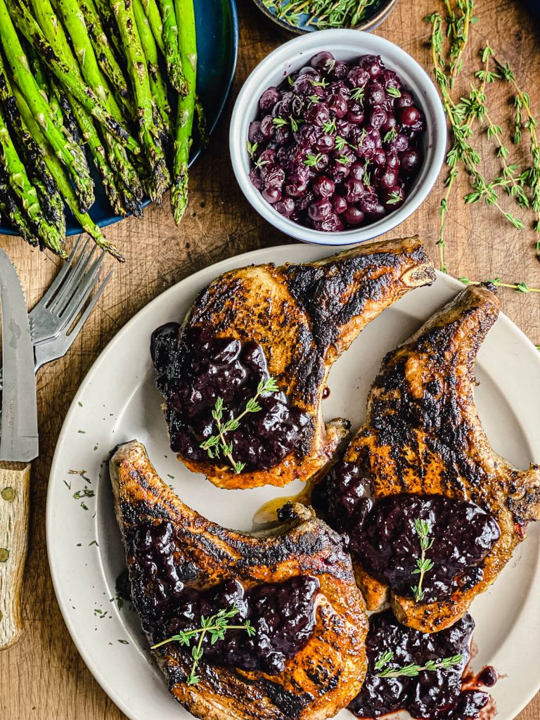 blueberry chipotle pork chops on a plate