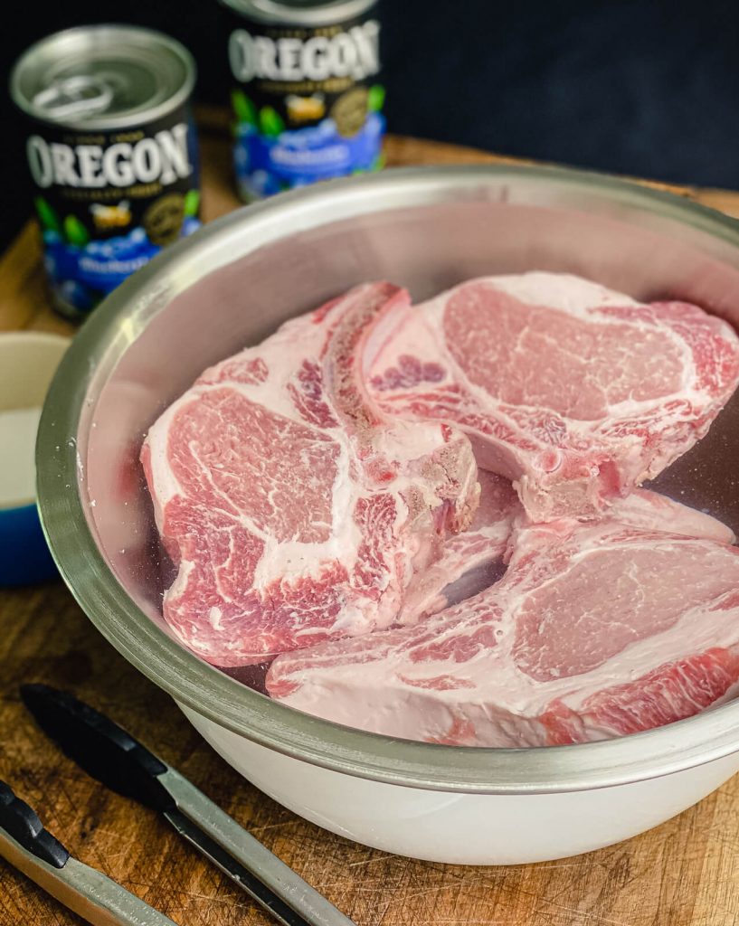 pork chops sitting in wet brine