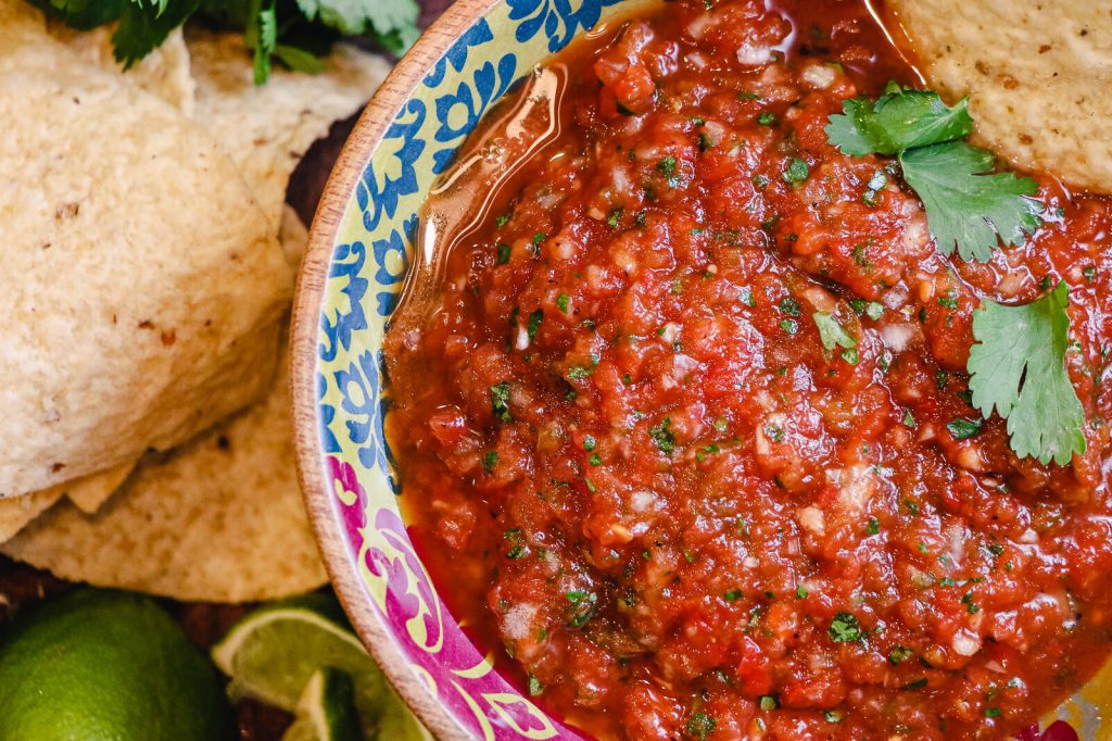 restaurant style salsa with limes and chips