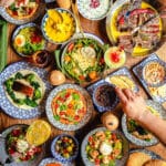 festive table loaded with Mexican food for Cinco de Mayo