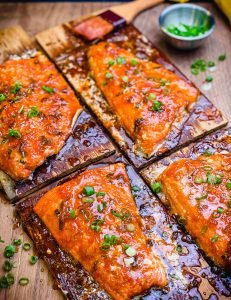 Honey sriracha plank salmon on cutting board