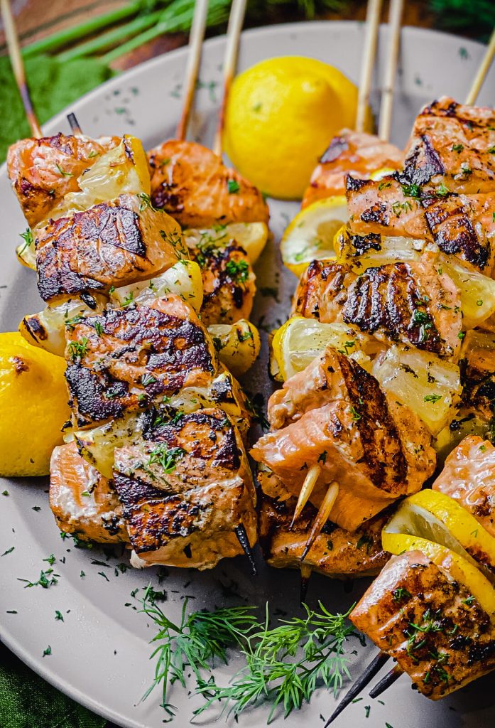 charred salmon kabobs on skewers