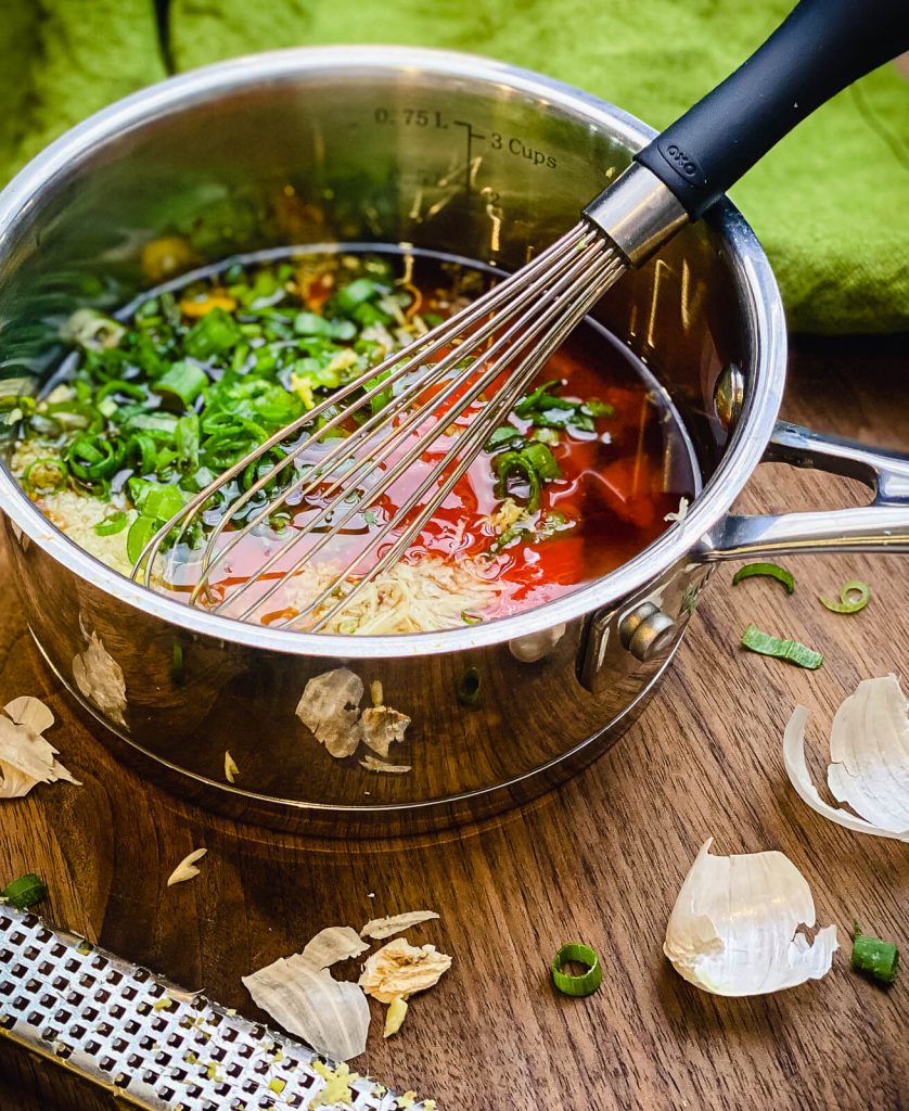 Honey sriracha sauce in a sauce pan