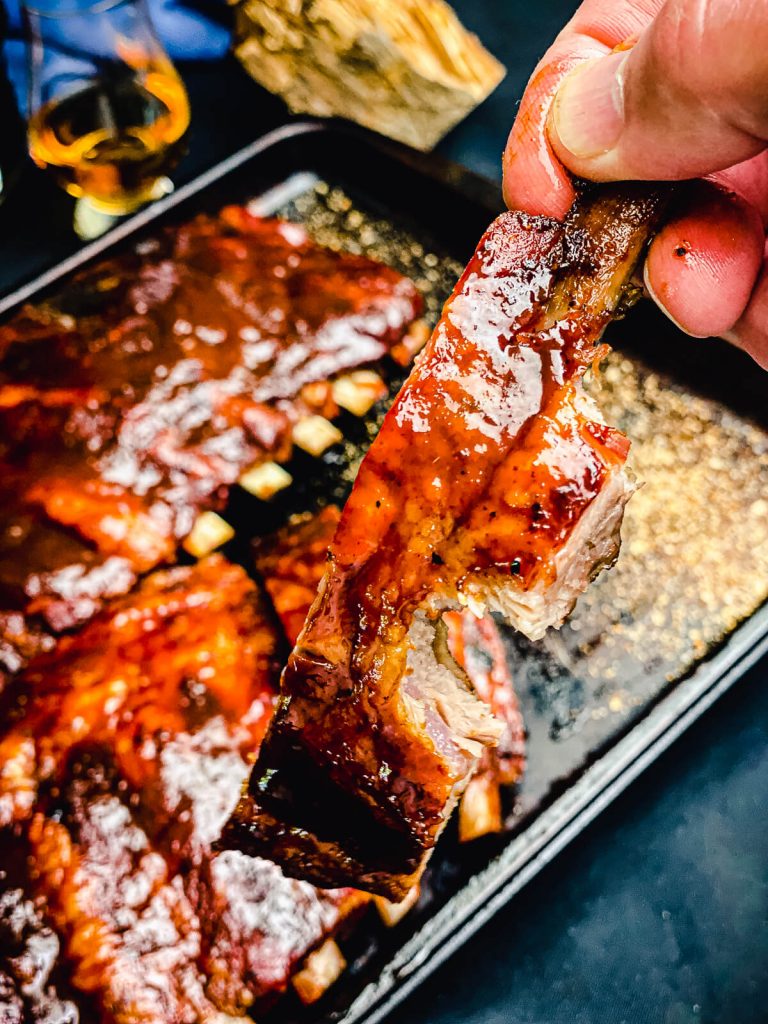 pork rib with a bite taken out of it