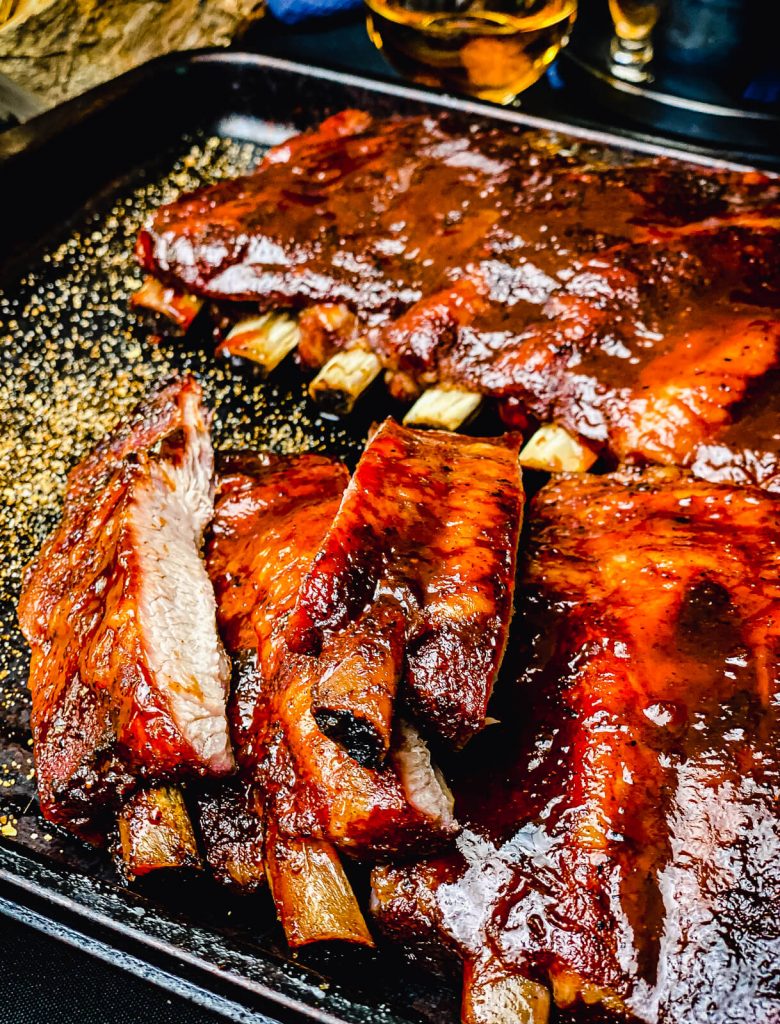 sliced pork ribs on a baking sheet