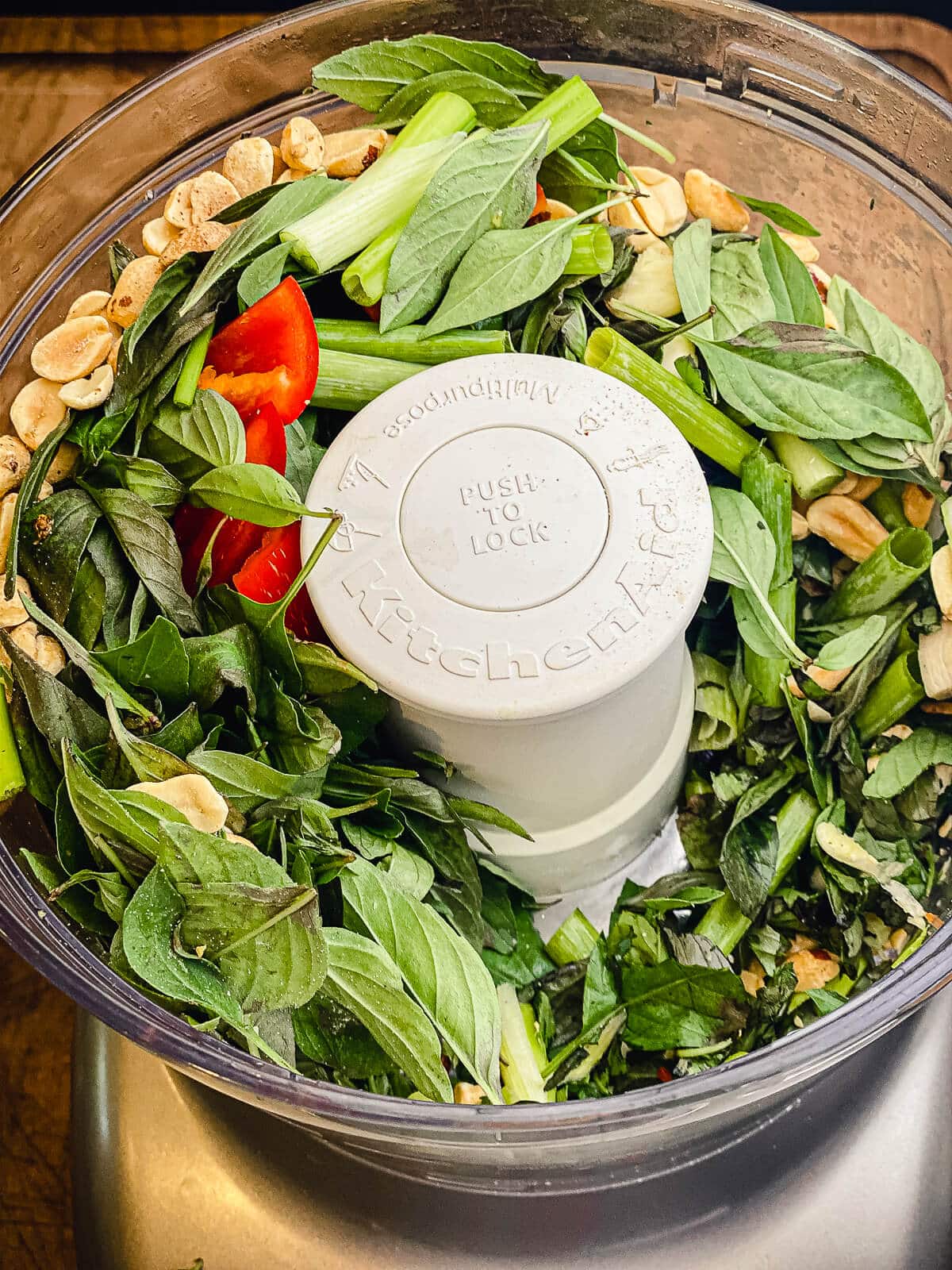 ingredients for Thai basil pesto in a food processor