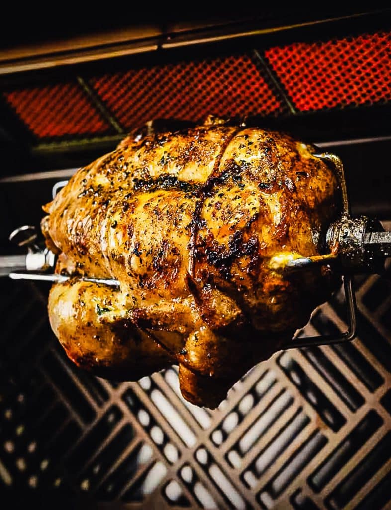 rotisserie chicken on the kalamazoo gas grill head