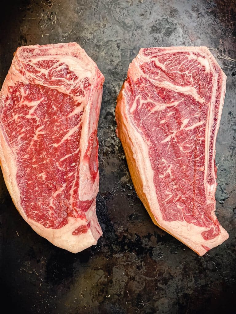 Kansas-city-strip-steaks-on-a-tray